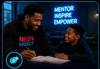 A mentor working with a teen beneath a MENTOR INSPIRE EMPOWER neon sign